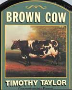 The pub sign. Brown Cow, Bingley, West Yorkshire