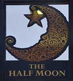 The pub sign. The Half Moon (Ex Tap & Spile), Bishop's Stortford, Hertfordshire