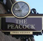 The pub sign. Peacock, Kettering, Northamptonshire