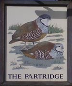 The pub sign. The Partridge, Partridge Green, West Sussex