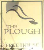The pub sign. The Plough, Holbeach St Johns, Lincolnshire