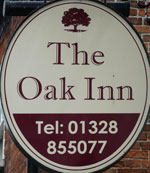 The pub sign. Oak Inn, Fakenham, Norfolk