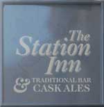 The pub sign. The Station Inn, Derby, Derbyshire