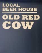 The pub sign. Old Red Cow, Smithfield, Central London