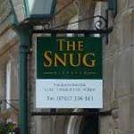 The pub sign. The Snug, Carnforth, Lancashire