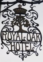 The pub sign. Royal Oak Hotel, Welshpool, Powys