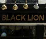 The pub sign. The Black Lion, Plaistow, Greater London
