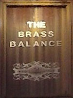 The pub sign. The Brass Balance, Birkenhead, Merseyside