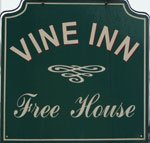 The pub sign. The Vine Inn, Honiton, Devon