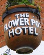 The pub sign. The Flower Pot Hotel, Aston, Berkshire