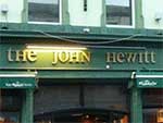 The pub sign. John Hewitt, Belfast, Ireland