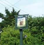 The pub sign. Olde Windmill Inn, Great Cressingham, Norfolk