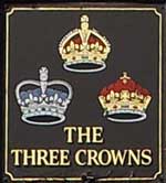 The pub sign. The Three Crowns, Bushey, Hertfordshire
