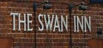The pub sign. The Swan Inn, Stalham, Norfolk