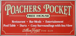 The pub sign. Poachers Pocket, Bacton, Norfolk