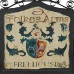 The pub sign. Ffolkes Arms, Hillington, Norfolk