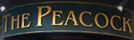 The pub sign. The Peacock, City, Central London