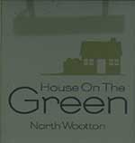 The pub sign. House on the Green, North Wootton, Norfolk