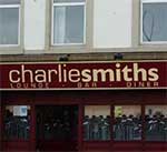 The pub sign. The Three Reasons (formerly Charlie Smiths), Largs, North Ayrshire