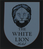 The pub sign. The White Lion Hotel, Tenterden, Kent