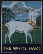 The pub sign. The White Hart, Stockbridge, Hampshire