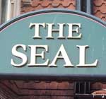 The pub sign. The Seal, Selsey, West Sussex