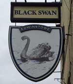 The pub sign. Black Swan, Edwinstowe, Nottinghamshire