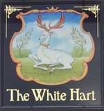 The pub sign. The White Hart, Arundel, West Sussex