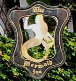 The pub sign. The Mermaid Inn, Rye, East Sussex