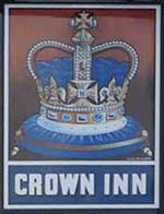 The pub sign. Crown Inn, Bridport, Dorset