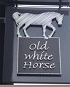 The pub sign. Old White Horse, Baldock, Hertfordshire