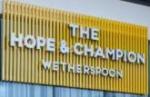 The pub sign. The Hope & Champion, Beaconsfield, Buckinghamshire