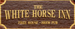 The pub sign. The White Horse Inn, Neatishead, Norfolk