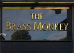 The pub sign. The Brass Monkey, Plymouth, Devon