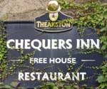 The pub sign. Chequers Inn, Ledsham, West Yorkshire