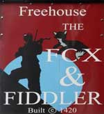 The pub sign. The Fox & Fiddler, Colchester, Essex