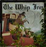 The pub sign. The Whip Inn, Lacey Green, Buckinghamshire