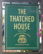 The pub sign. Thatched House, Poulton-le-Fylde, Lancashire