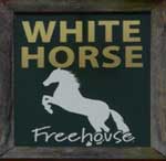 The pub sign. White Horse, Thelnetham, Suffolk