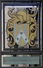 The pub sign. Carpenters Arms, Fitzrovia, Central London