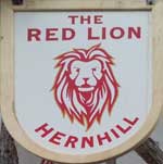 The pub sign. The Red Lion, Hernhill, Kent