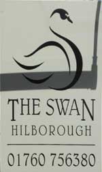 The pub sign. The Swan, Hilborough, Norfolk