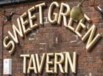 The pub sign. Sweet Green Tavern, Bolton, Greater Manchester