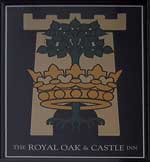 The pub sign. The Royal Oak & Castle, Pevensey, East Sussex