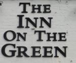 The pub sign. Inn on the Green, Ockley, Surrey
