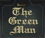 The pub sign. Green Man Inn, Bradwell-on-Sea, Essex