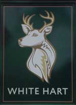 The pub sign. White Hart, Roydon, Essex