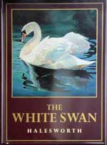 The pub sign. White Swan, Halesworth, Suffolk