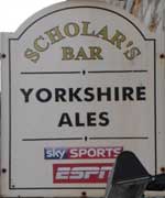The pub sign. Scholar's Bar, Scarborough, North Yorkshire