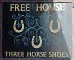 The pub sign. Three Horseshoes, Norton Canon, Herefordshire